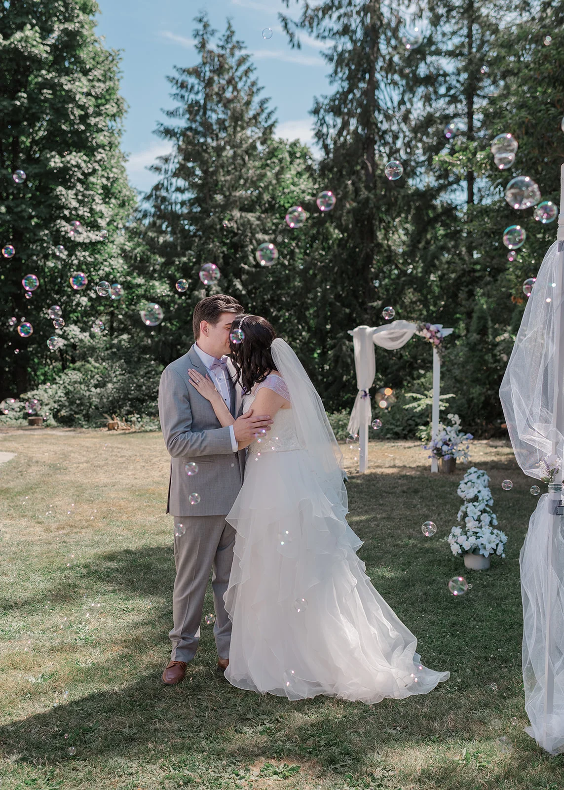 bride and groom processional summer backyard wedding in mission, british columbia
