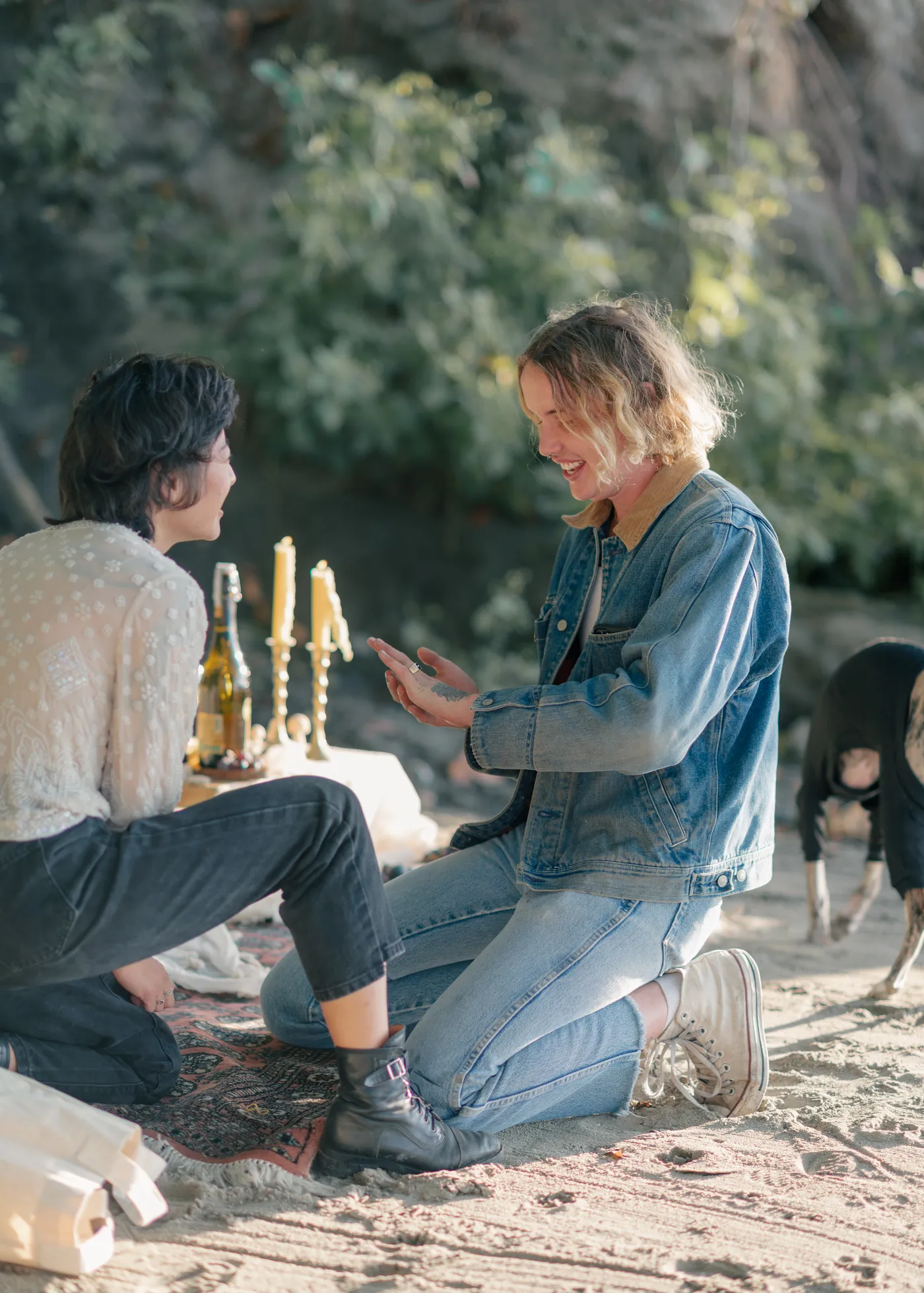 A beautiful same-sex marriage proposal under a tree in a secluded forest in Canada. This intimate LGBTQ+ engagement was documented by a queer-friendly photographer specializing in proposals across Canada, including British Columbia, Alberta and Ontario.