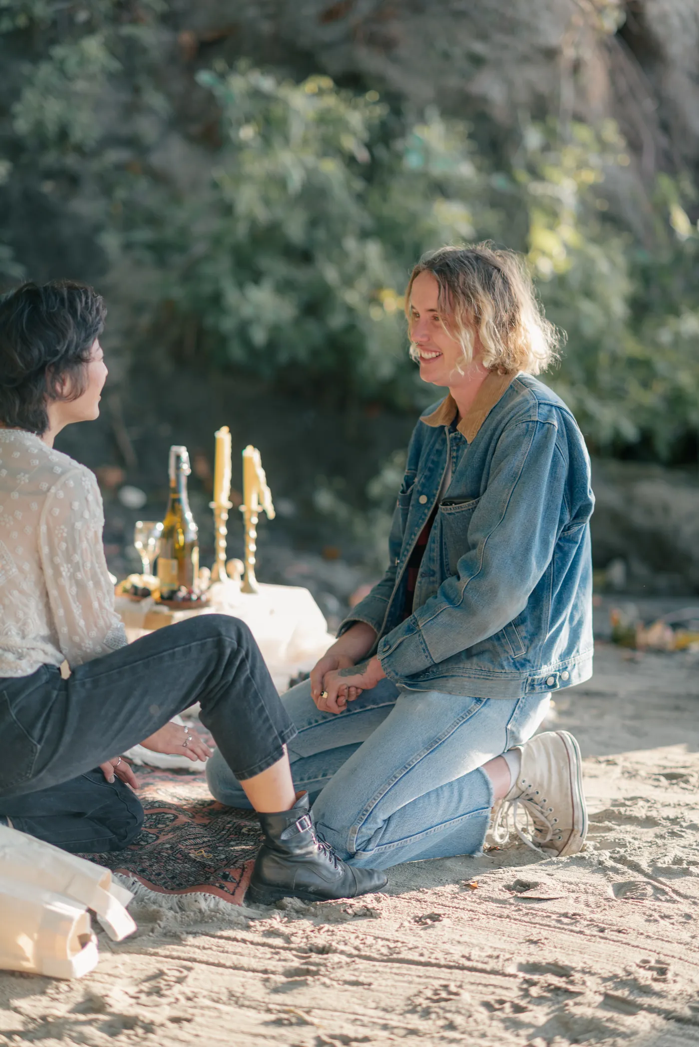 A beautiful same-sex marriage proposal under a tree in a secluded forest in Canada. This intimate LGBTQ+ engagement was documented by a queer-friendly photographer specializing in proposals across Canada, including British Columbia, Alberta and Ontario.