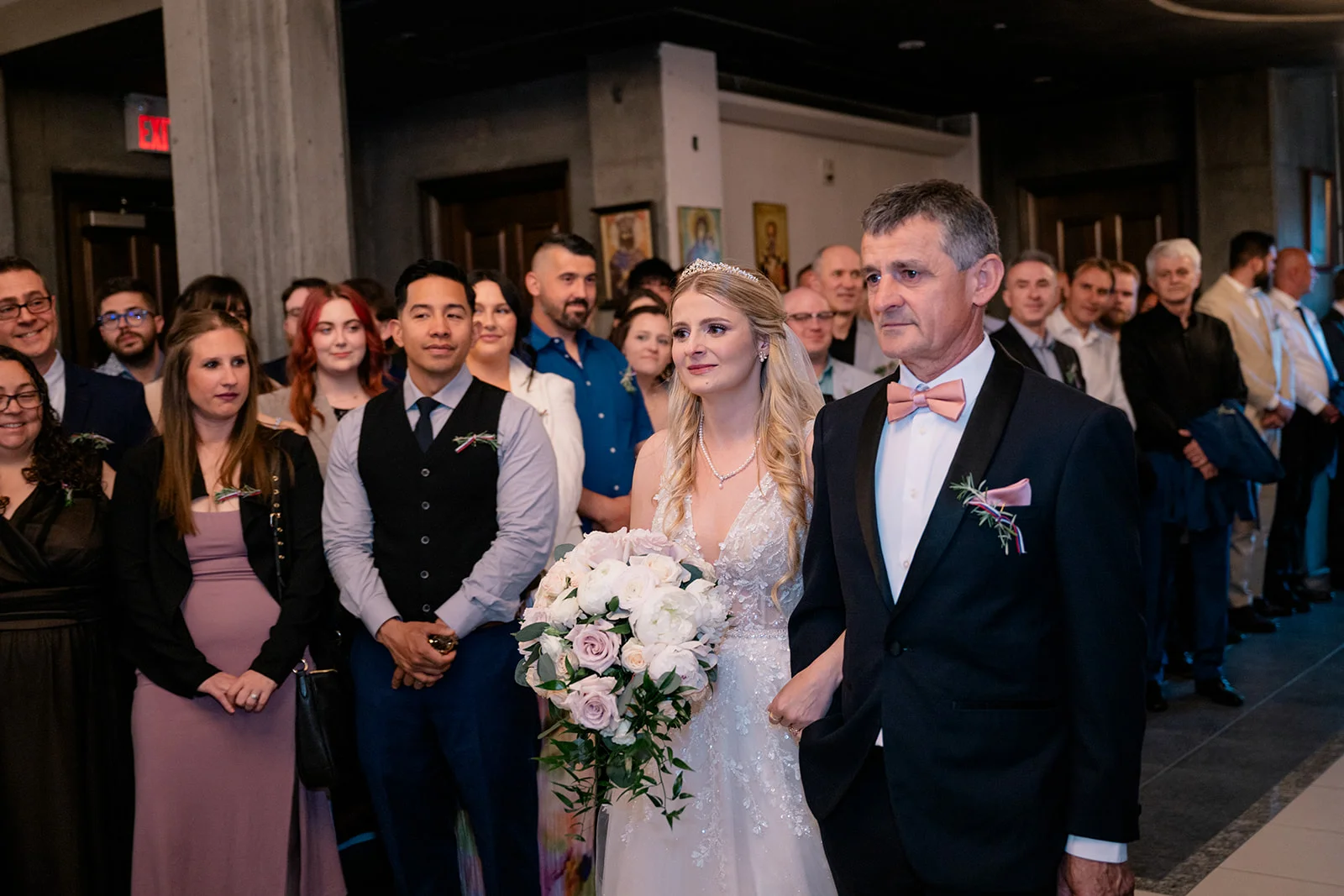 Serbian Orthodox wedding ceremony with traditional rituals including candles, crowns, and cords