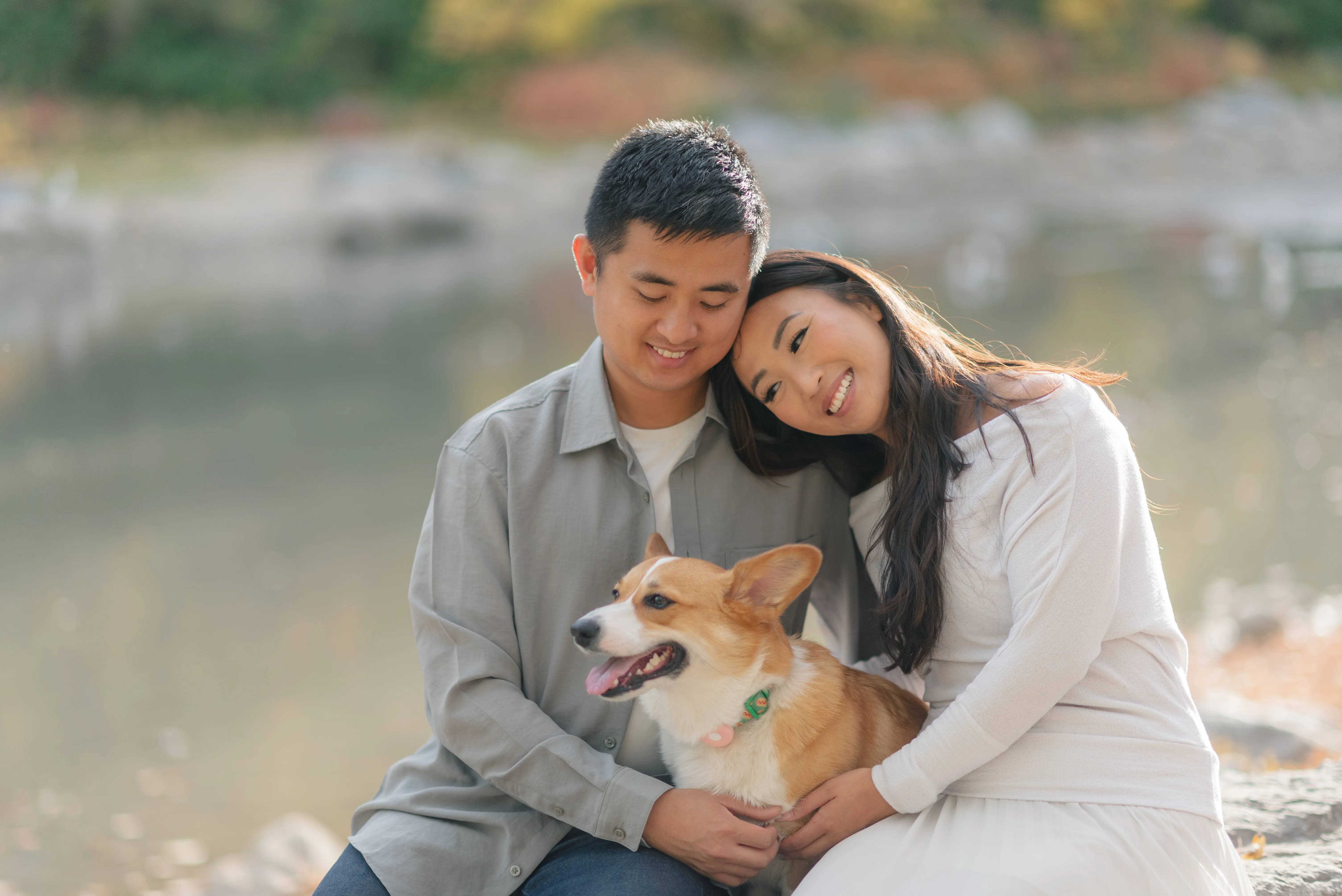 Lifestyle couples photo with dog in downtown Calgary park