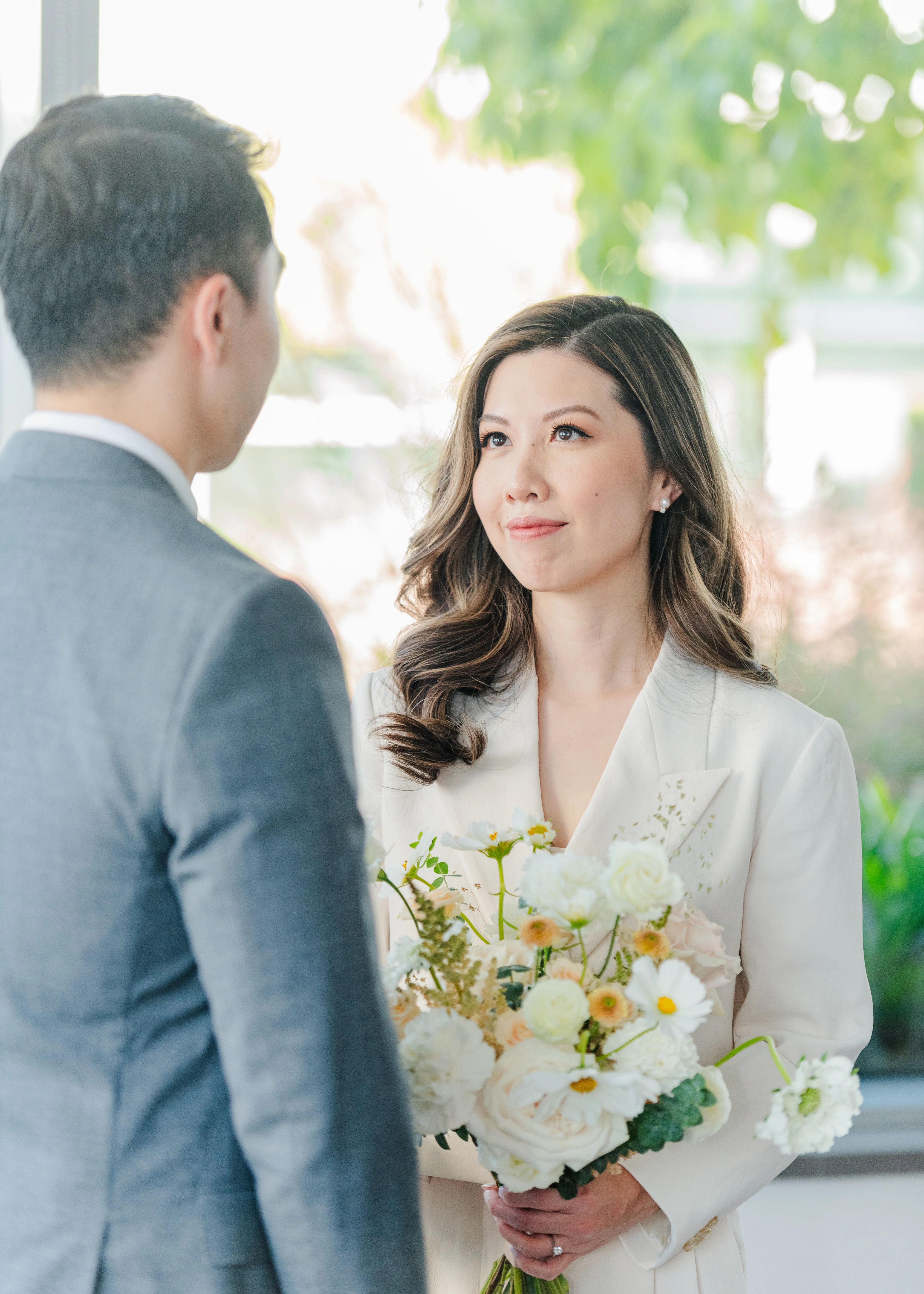 bride looking at groom during civil ceremony in Vancouver, B.C.