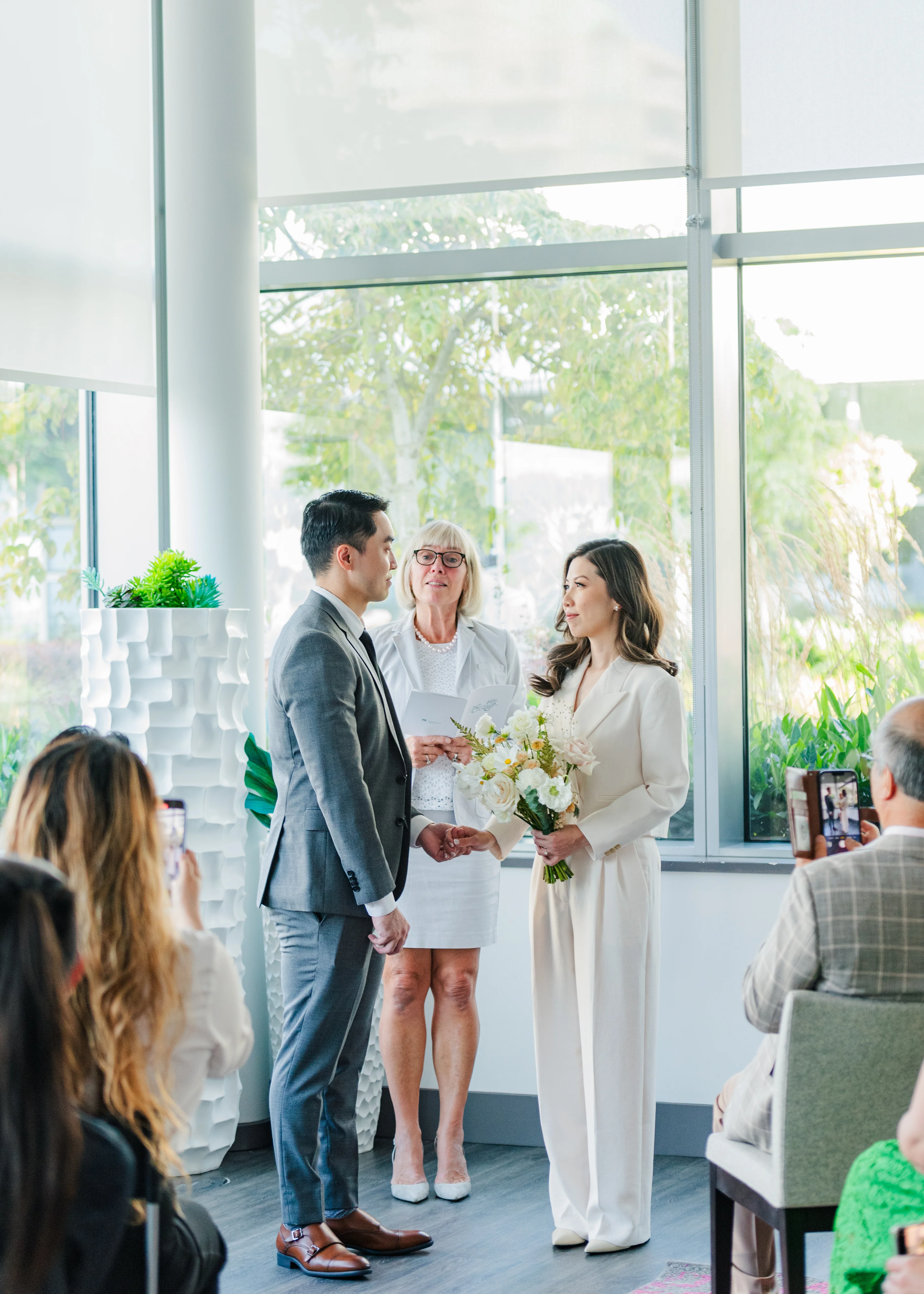 bride looking at groom during civil ceremony in Vancouver, B.C.