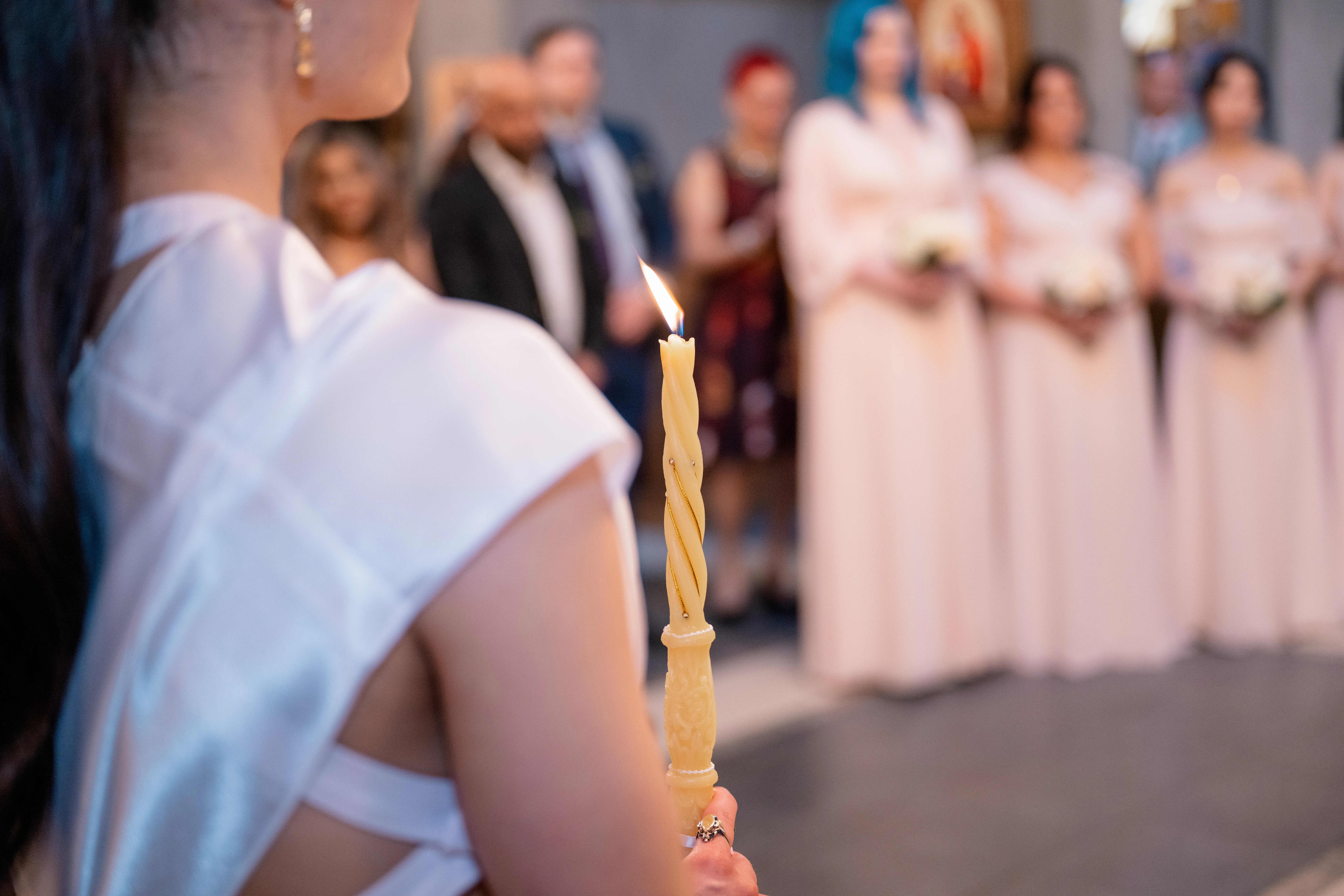 Serbian Orthodox wedding ceremony with traditional rituals including candles, crowns, and cords