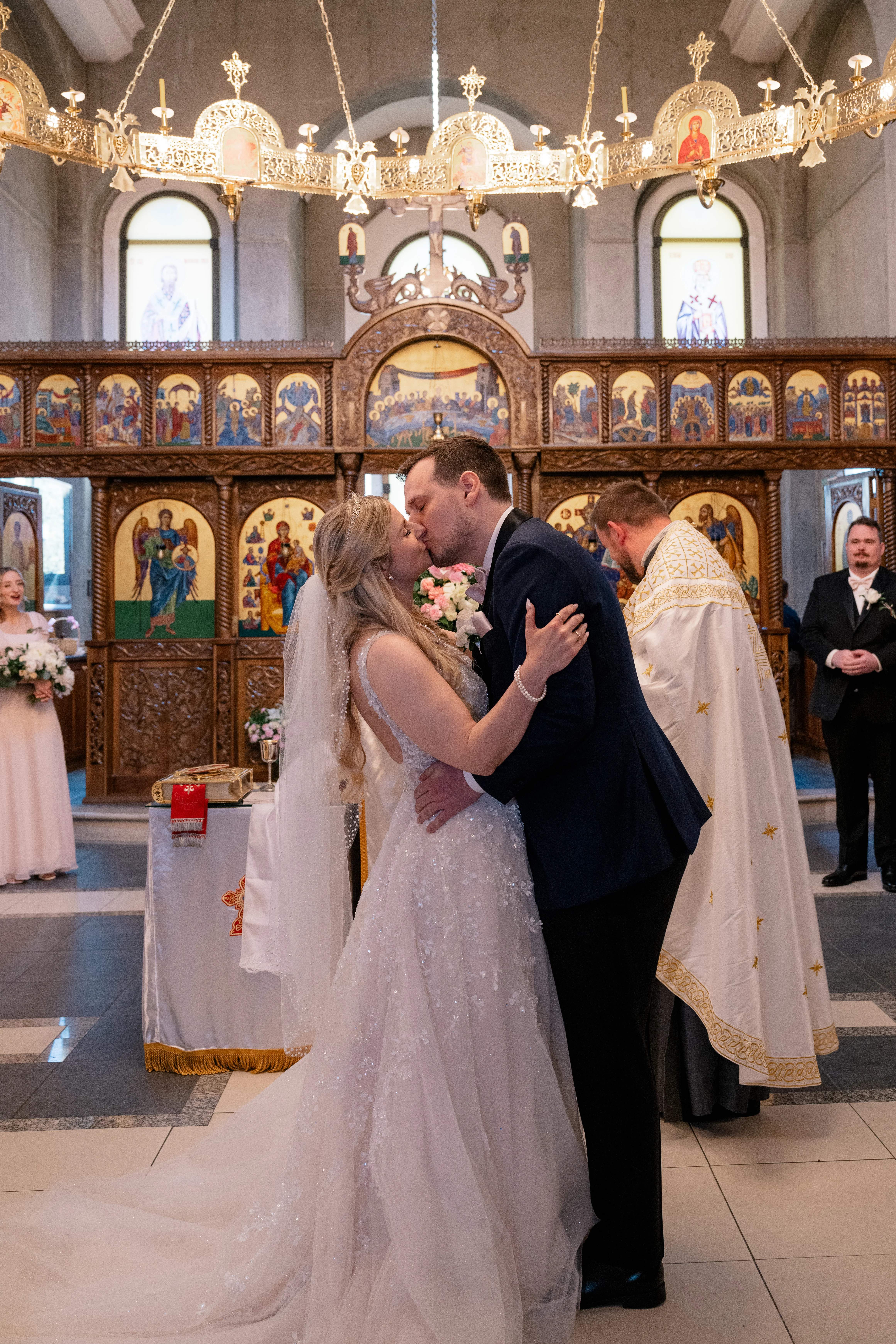 Serbian Orthodox wedding ceremony with traditional rituals including candles, crowns, and cords