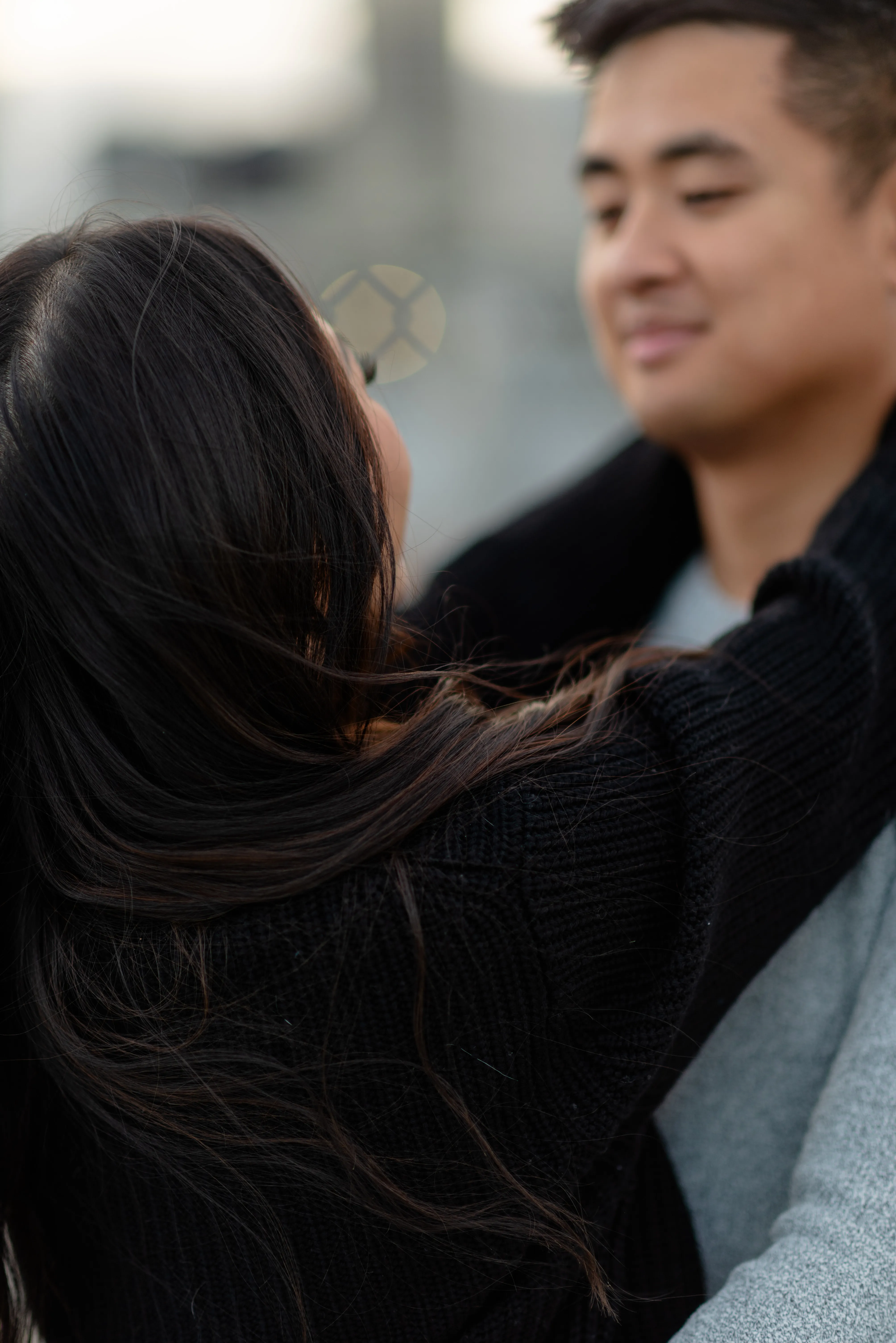 Couples photoshoot overlooking downtown Calgary skyline