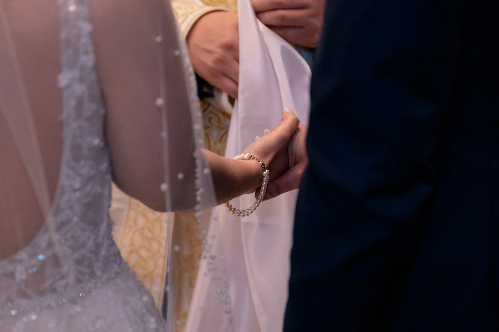 Serbian Orthodox wedding ceremony with traditional rituals including candles, crowns, and cords