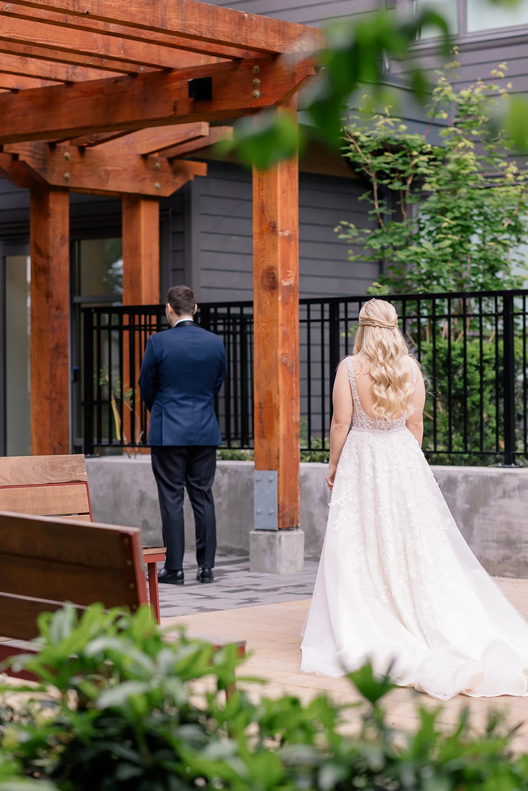 Bride and groom seeing each other for the first time on their wedding day, sharing an emotional and heartfelt moment.