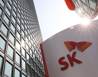 K Global Chemicals product collage featuring warehouse shelves stocked with containers, white polymer pellets, hand holding c