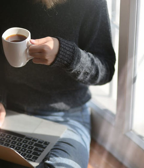woman with coffee laptop.jpg
