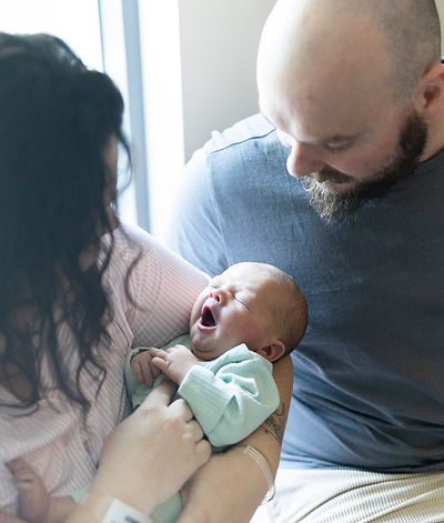 parents holding newborn during Fresh 48 session at Mater Mothers Hospital South Brisbane