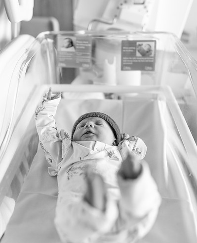 Fresh 48 newborn photography session at Mater Mothers Hospital in Brisbane with baby resting in hospital bassinet