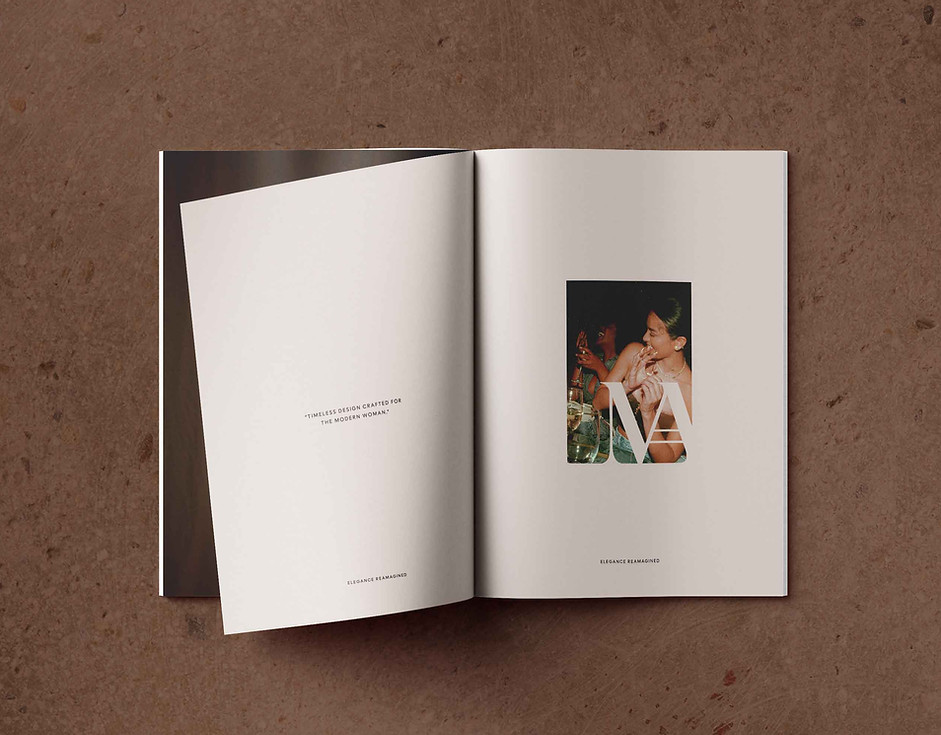 Open spread featuring minimalist layout with fashion portrait — timeless magazine design.