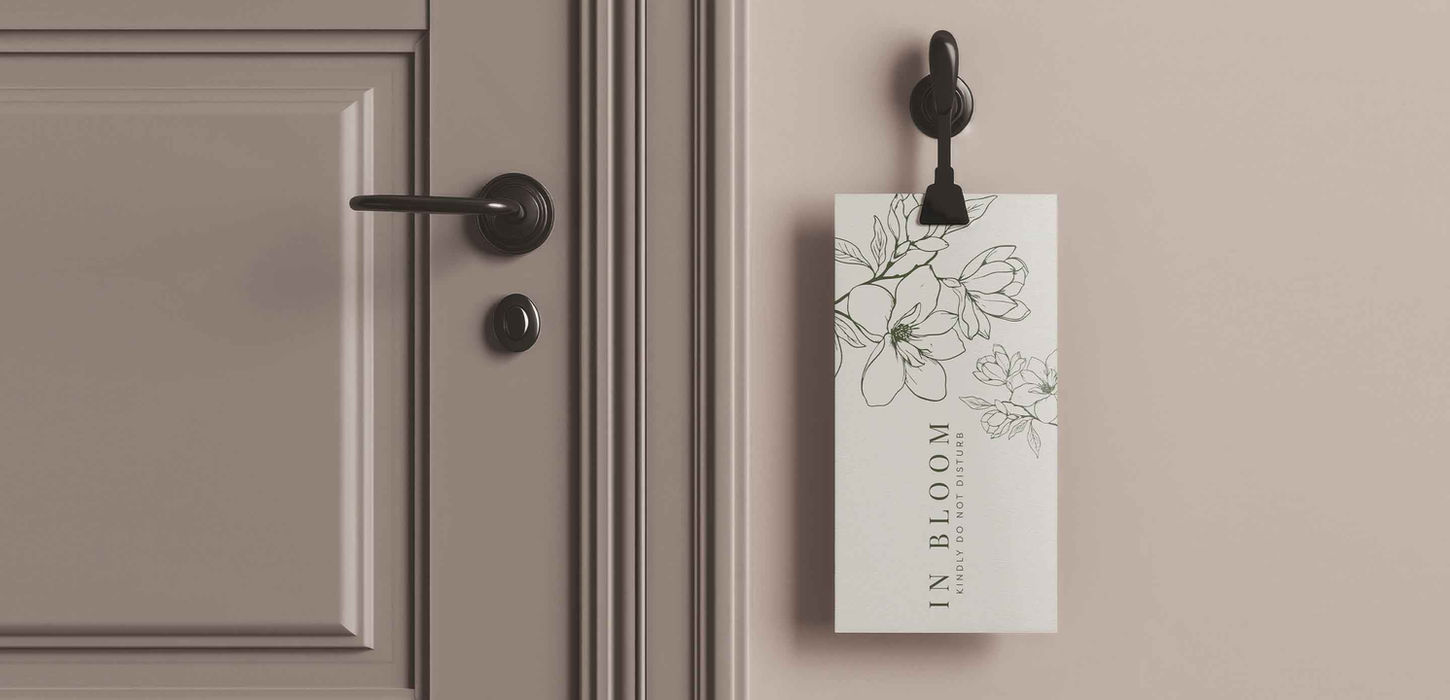 Hotel Verde In Bloom botanical door hanger on hotel room door — luxury hospitality brand collateral by Studio Ruby Signorelli