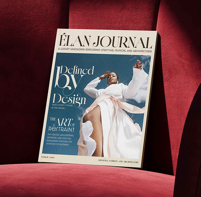 Magazine ELAN JOURNAL, Defined By Design cover, sitting on a red chair rubysignorelli.com