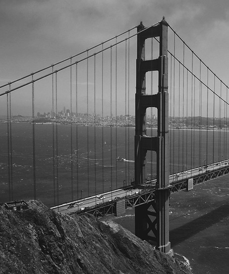 Golden Gate Bridge in San Francisco, California, over water and coastline.