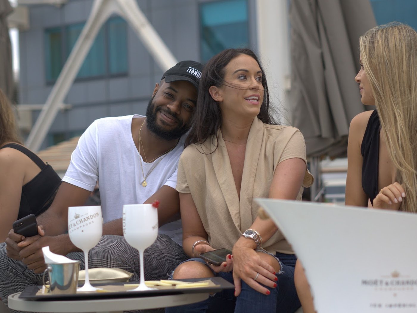 The selection panel in conversation with a candidate on a Barcelona rooftop
