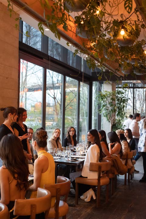 Curated guest list seated at a private dining event