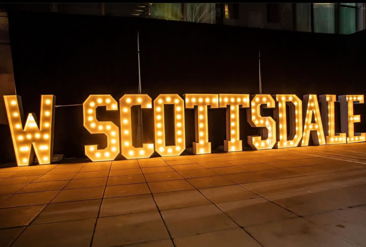 Illuminated W Scottsdale marquee letters outside an evening venue activation