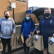 The Pass the parcel team ready to deliver