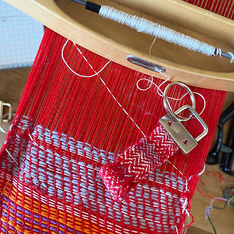 Handwoven keyring on loom