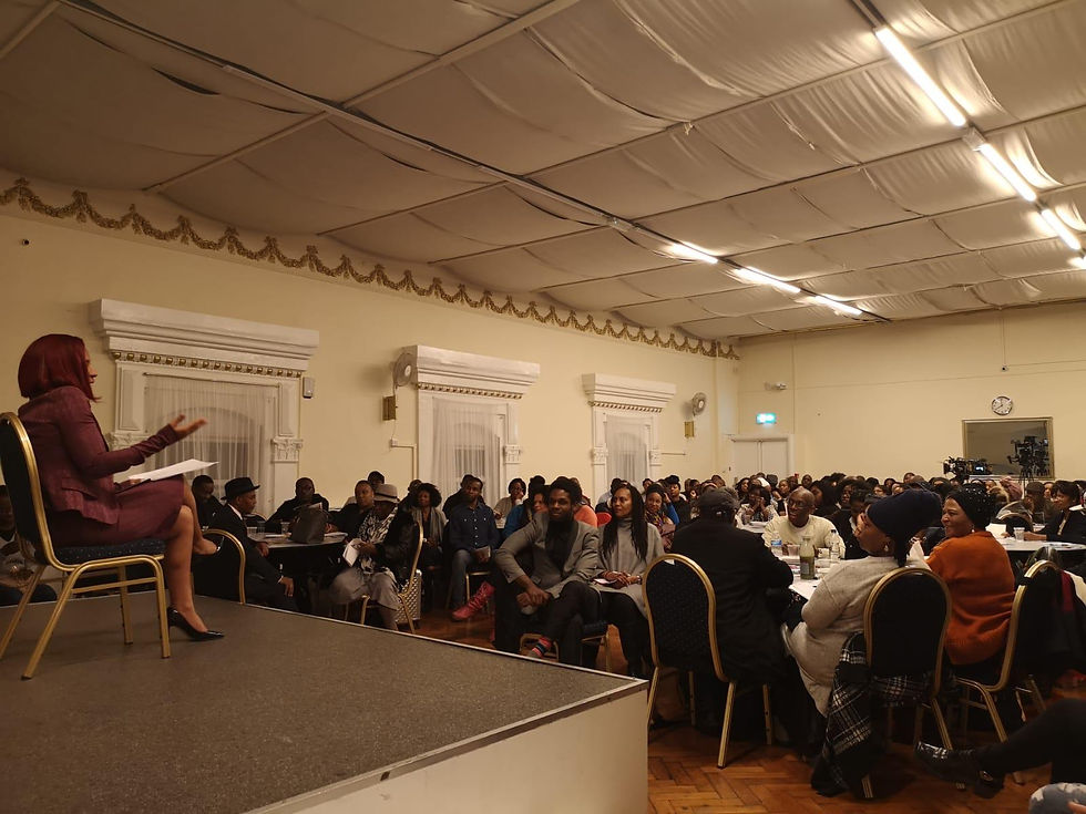 Pamela speaking at a property event