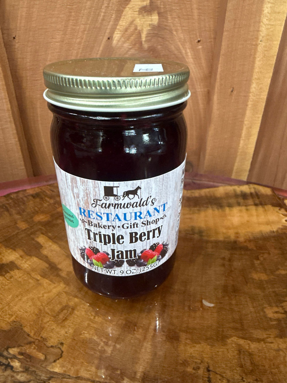 9oz jar of Farmwald's Triple Berry Jam with no added sugar