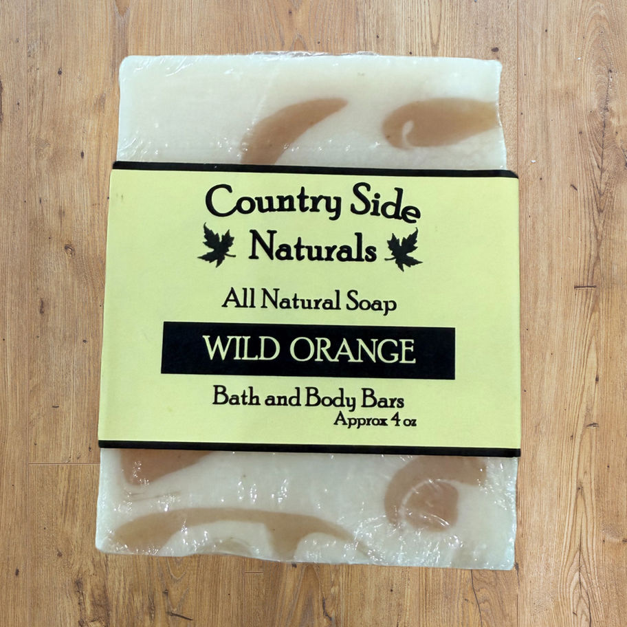 Country Side Naturals Wild Orange soap bar on wood surface