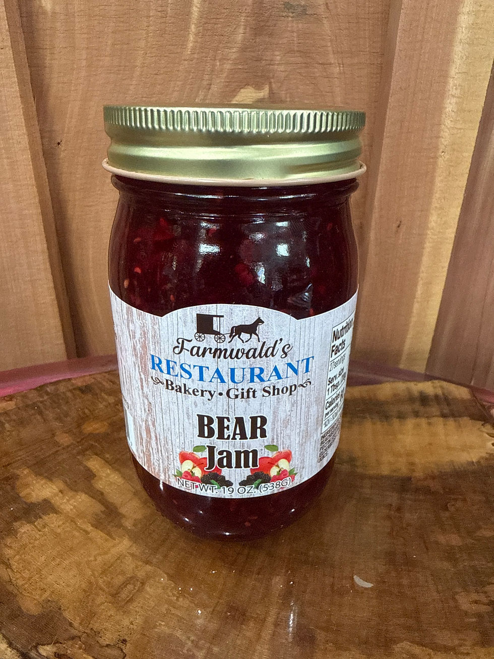 Farmwald's Restaurant Bear Jam 19oz jar on a wooden surface