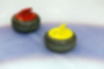 Two Curling Stone On Ice