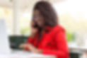 cheerful-woman-using-laptop-smartphone.jpg