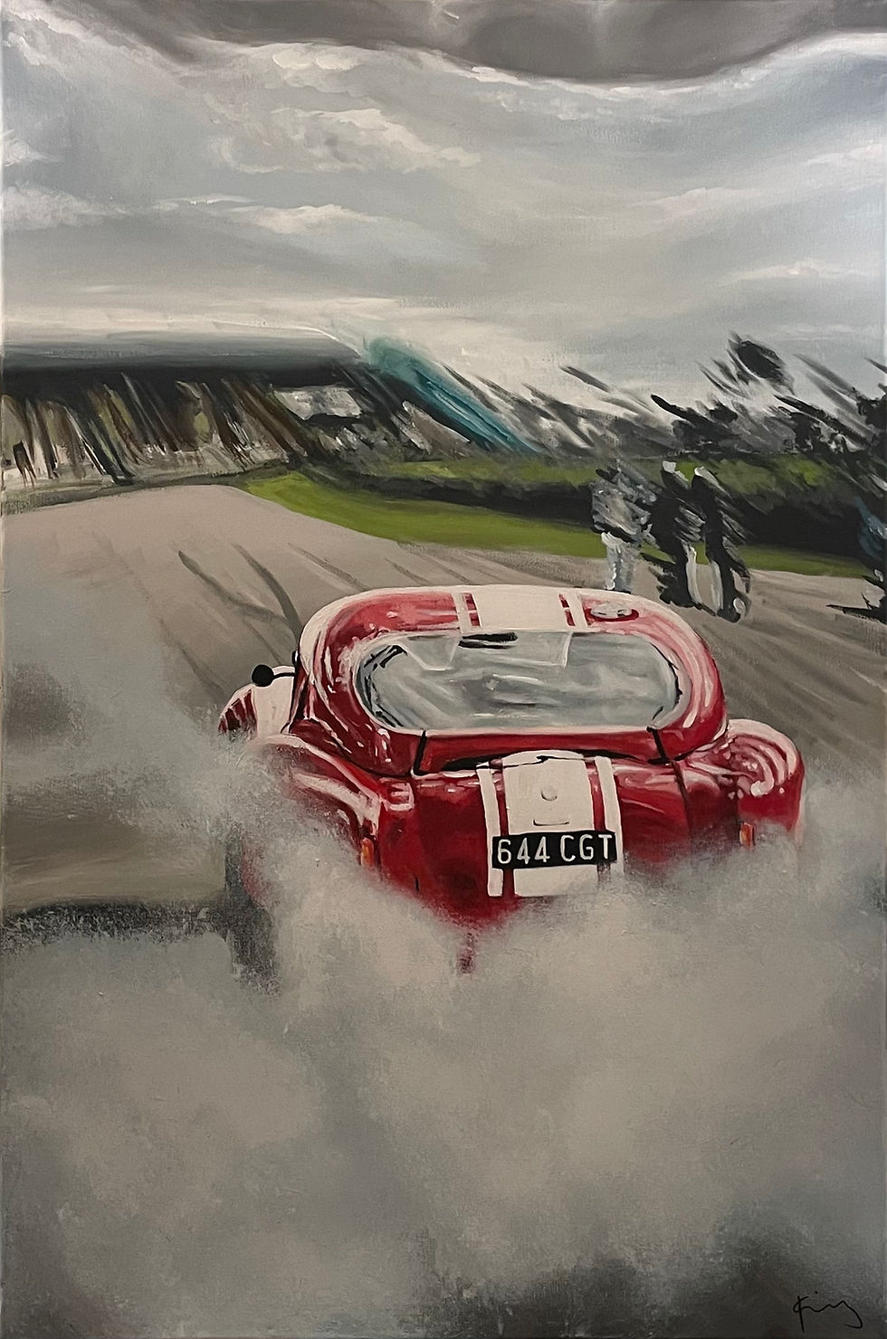 Red race car skidding, tires smoking on a track