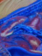 Textured abstract art in blue and purple