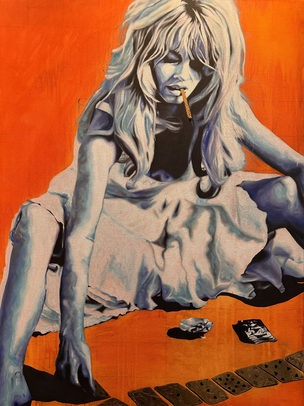 Blue-toned Brigitte Bardot with cigarette and playing cards overlayed on an orange background