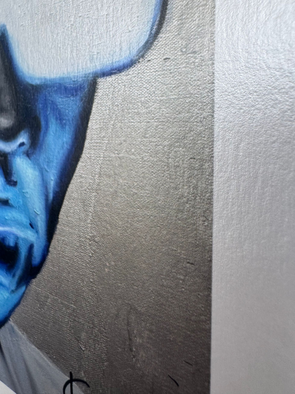 Thumbnail: Tyler the Creator blue face on silver background
