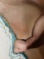 Abstract painting with skin tones, blue, white, and gold accents