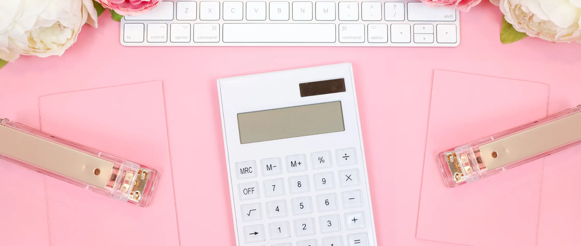 Calculator on pink background for Live-in Care cost
