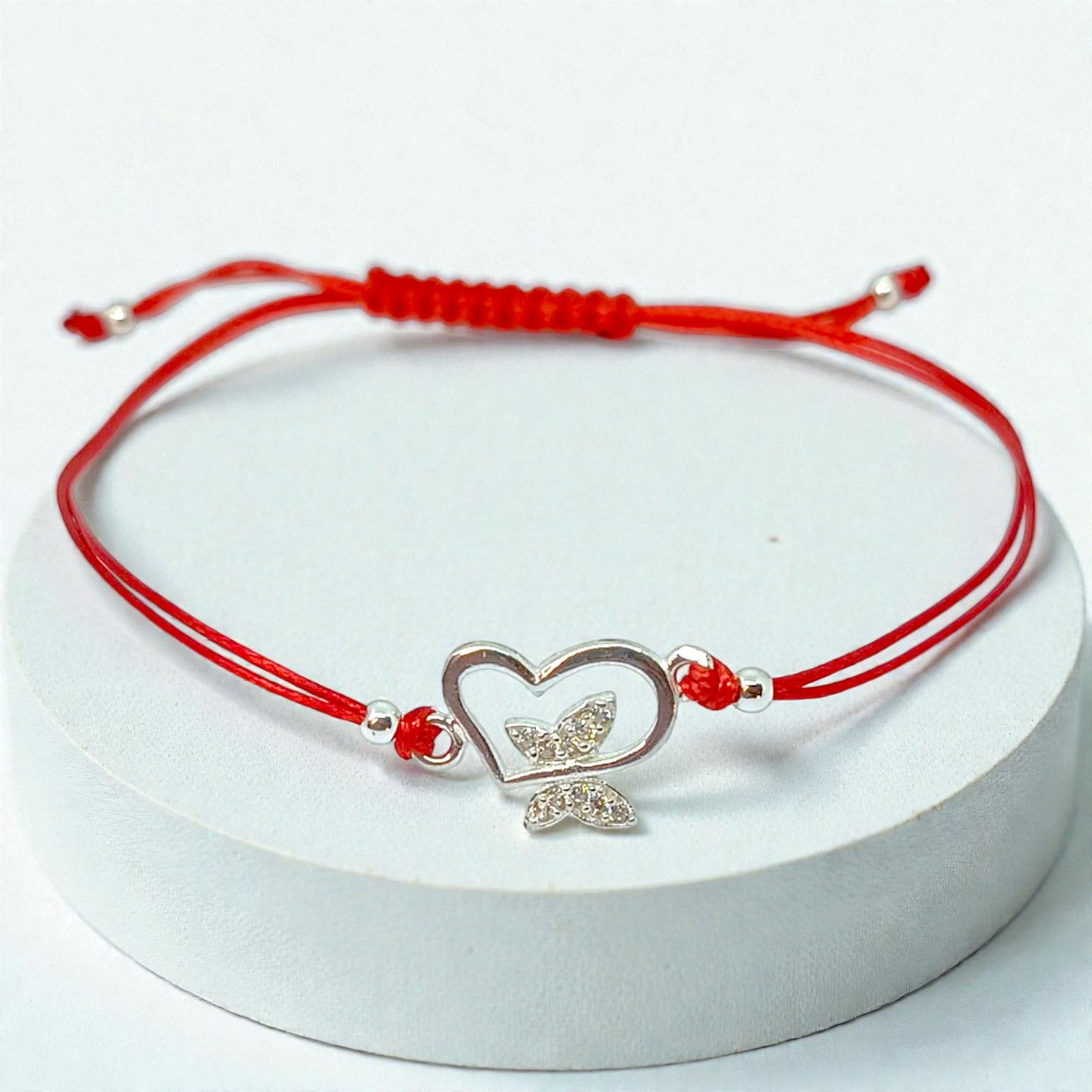 Сребърна гривна „Сърце и Пеперуда“ с червен конец и цирконий