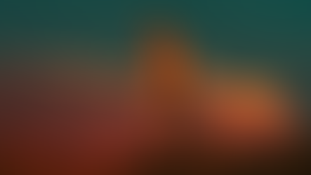 woman walking over rocks with cloud in the background