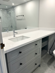Custom vanity with quartz countertop for a downtown condo