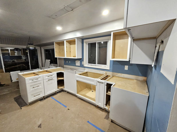 Maple wood kitchen cabinetry with wood carcasses