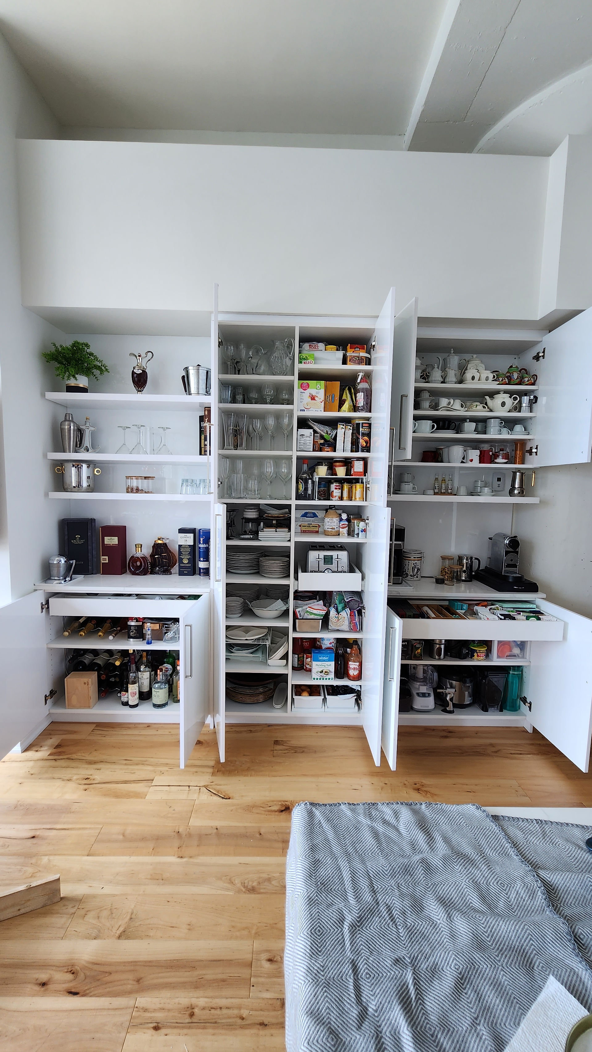 Custom pantry designed and installed by Reno Rabbit in the heart of Toronto for extra storage.