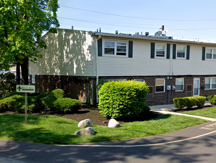 row of barack style townhomes