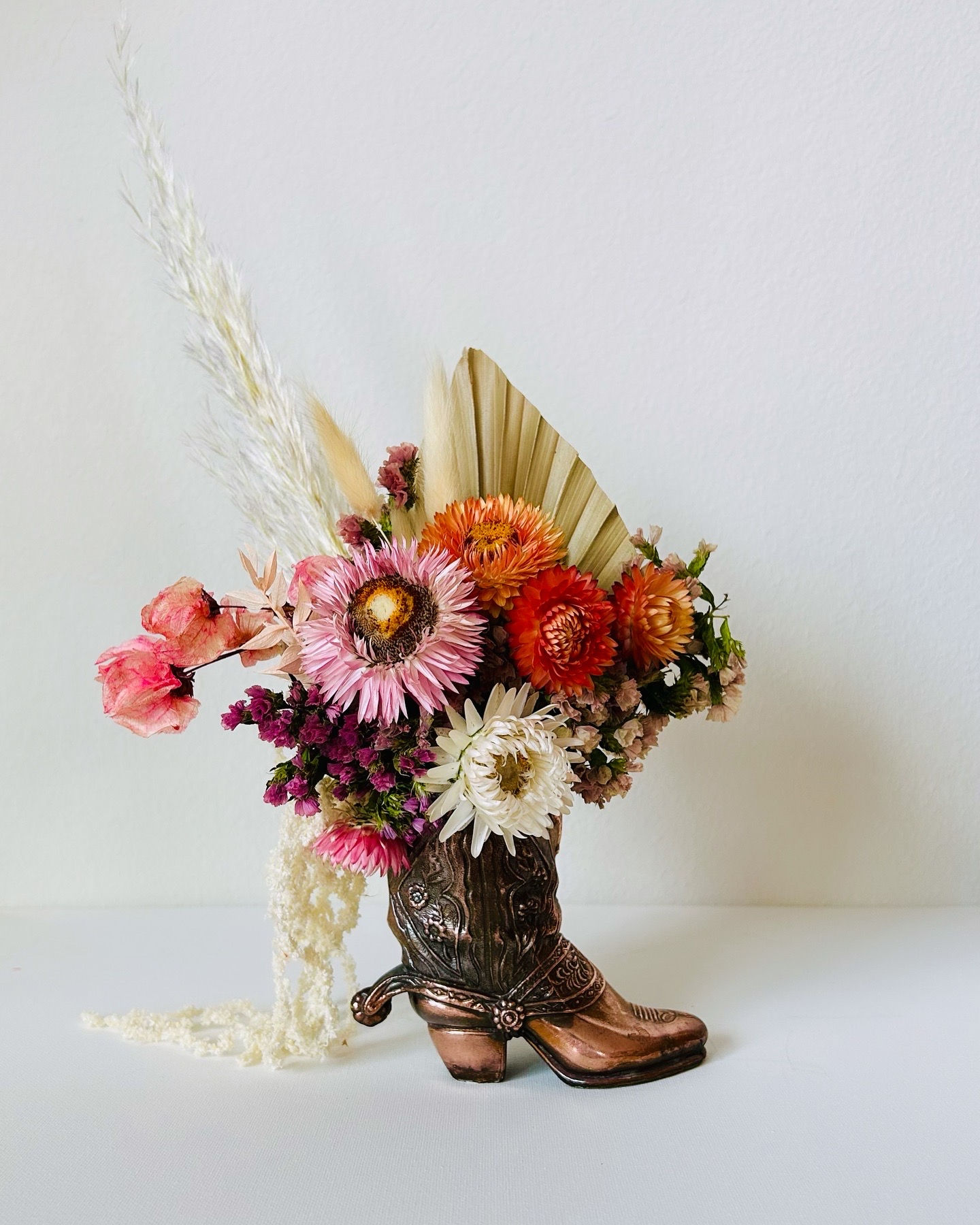 vintage copper cowboy boot arrangement