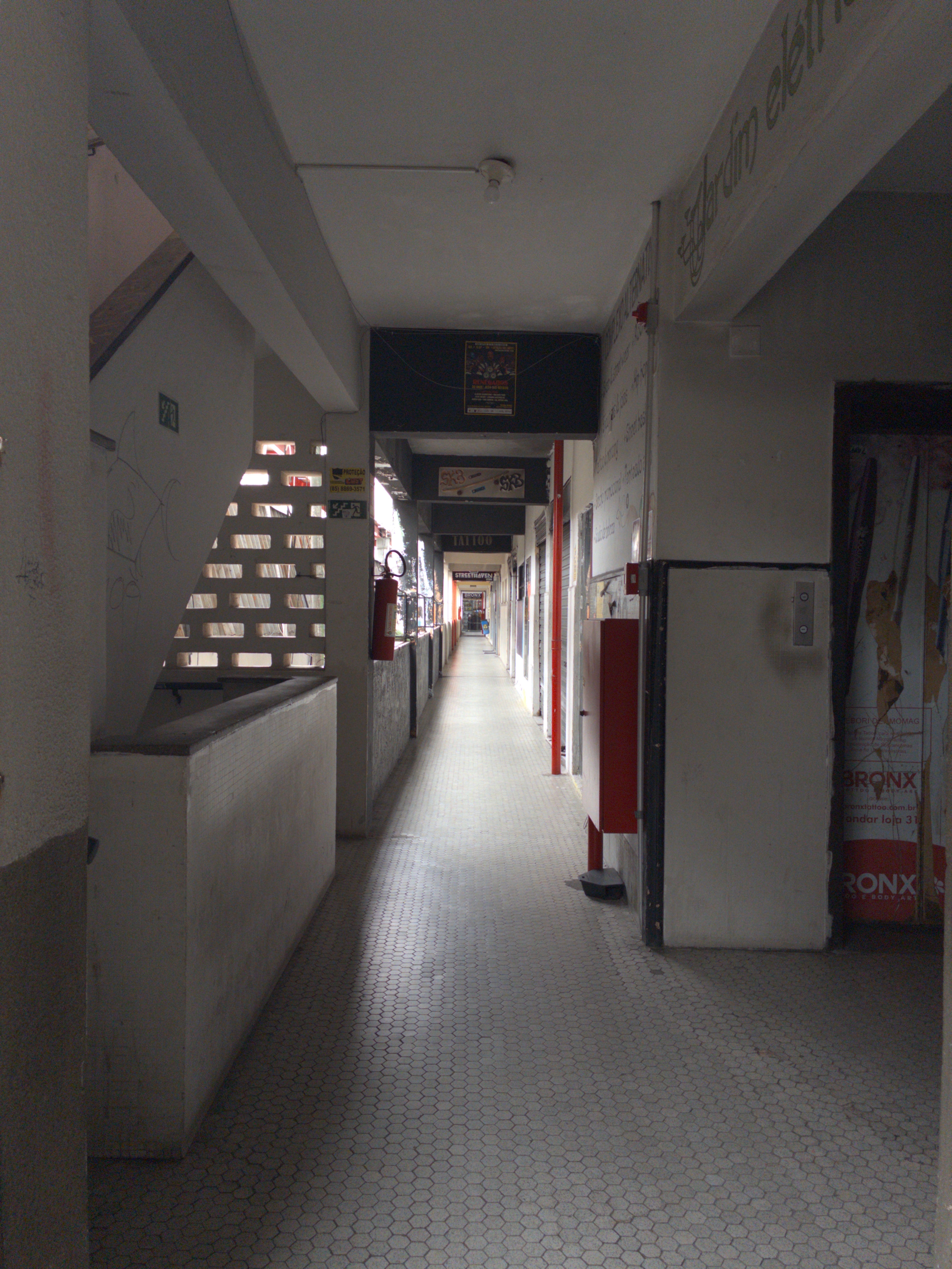 Guzz Lima - One way through the downtown gallery of stores