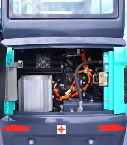 Internal electronics and integrated on-board charging system of a Wacker Neuson EZ17e electric excavator for zero-emission operation.