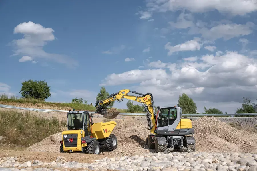 Thumbnail: Two Wacker Neuson DW90 cabbed dumpers operating on a UK construction site.