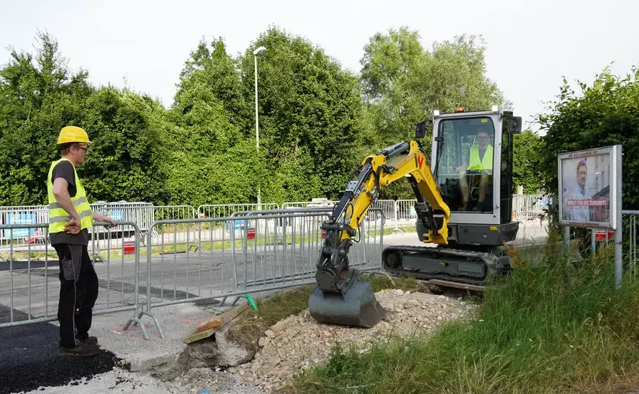Thumbnail: Wacker Neuson EZ26 working in a residential area, perfect for narrow-access UK utility projects.