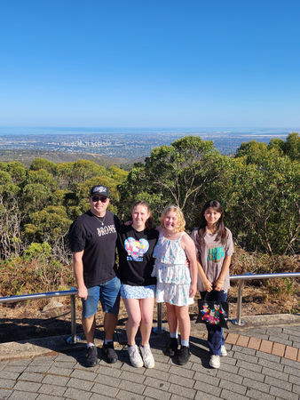 Family standing for a photo Mount Lofty Summit Lookout on an Adelaide Hills Tour