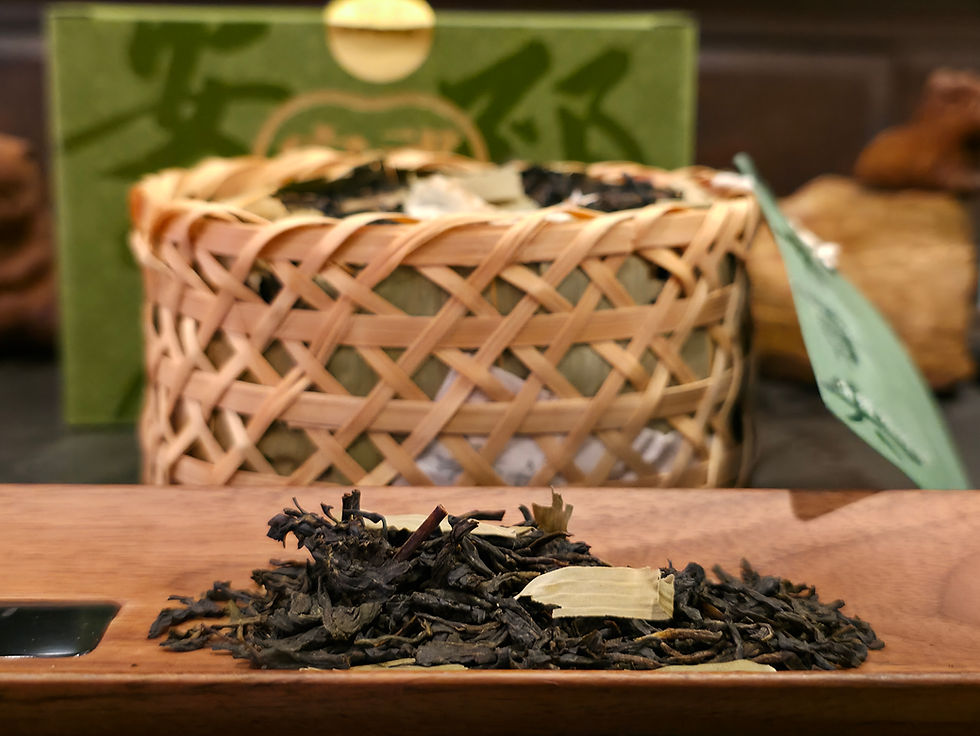 A basket of An Cha with leaves ready for brewing